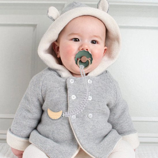 Attache tétine accroché à la sucette