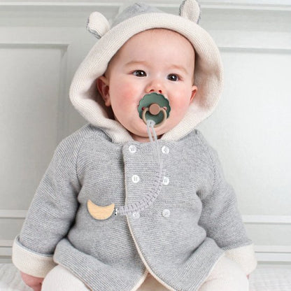 Attache tétine accroché à la sucette