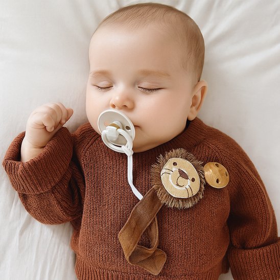 Attache tetine bébé qui dort
