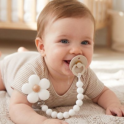 Attache tetine marron