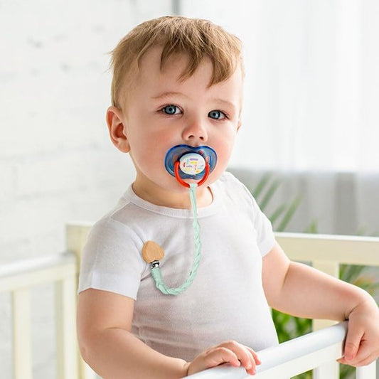 bébé porte Attache tetine 